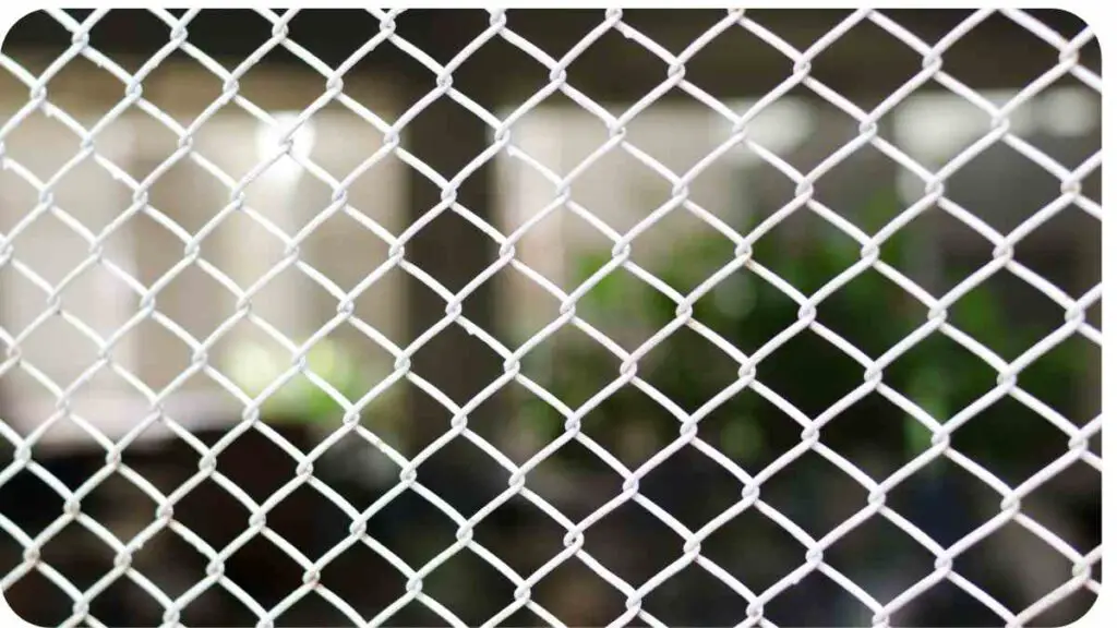 a close up photo of a chain link fence