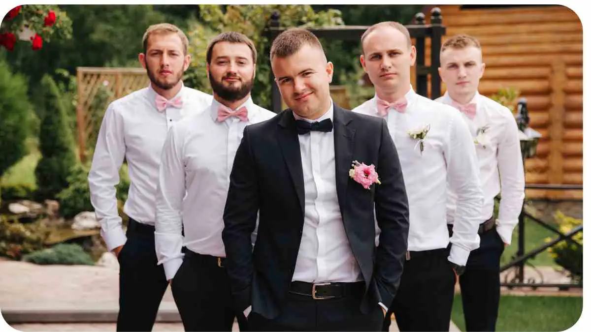 a group wearing tuxedos and bow ties