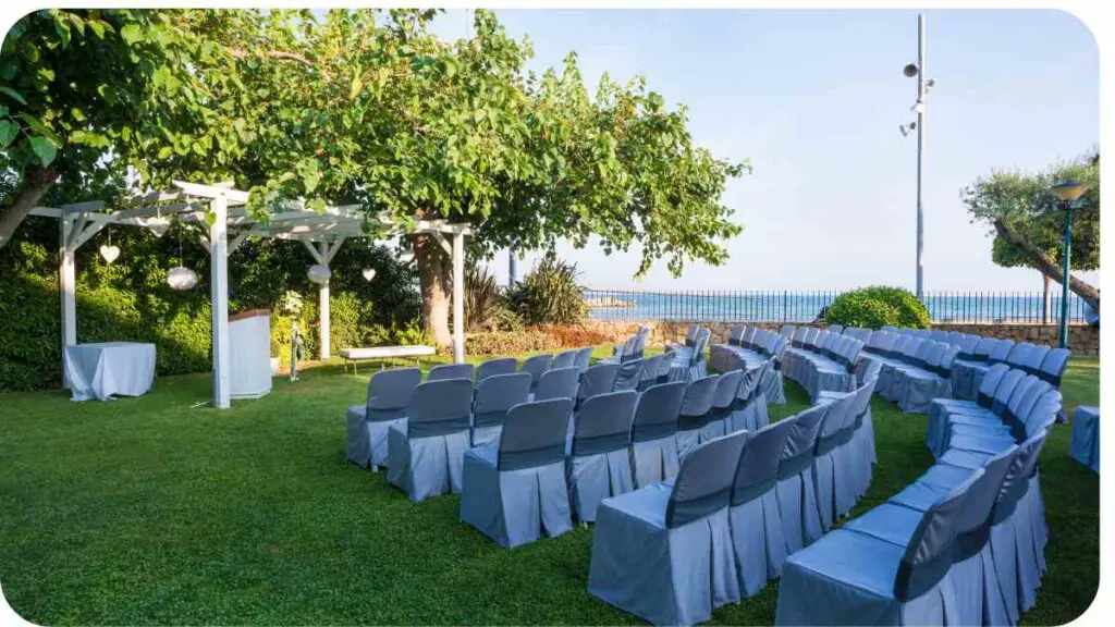 an outdoor wedding ceremony set up with chairs and a gazebo